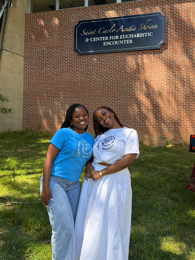 MAGIS USA co-founders smiling together outside the Saint Carlo Acutis Shrine