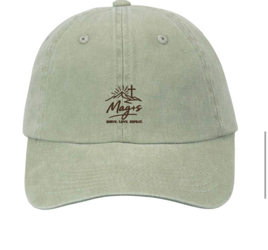 Sage green dad cap with an embroidered Mag+s logo