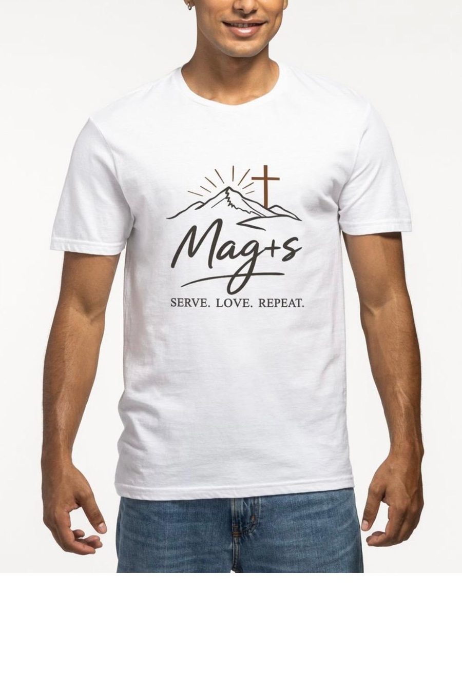A member wearing a white Mag+s tee